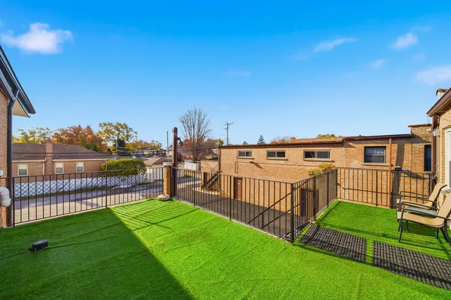 a view of a house with a street