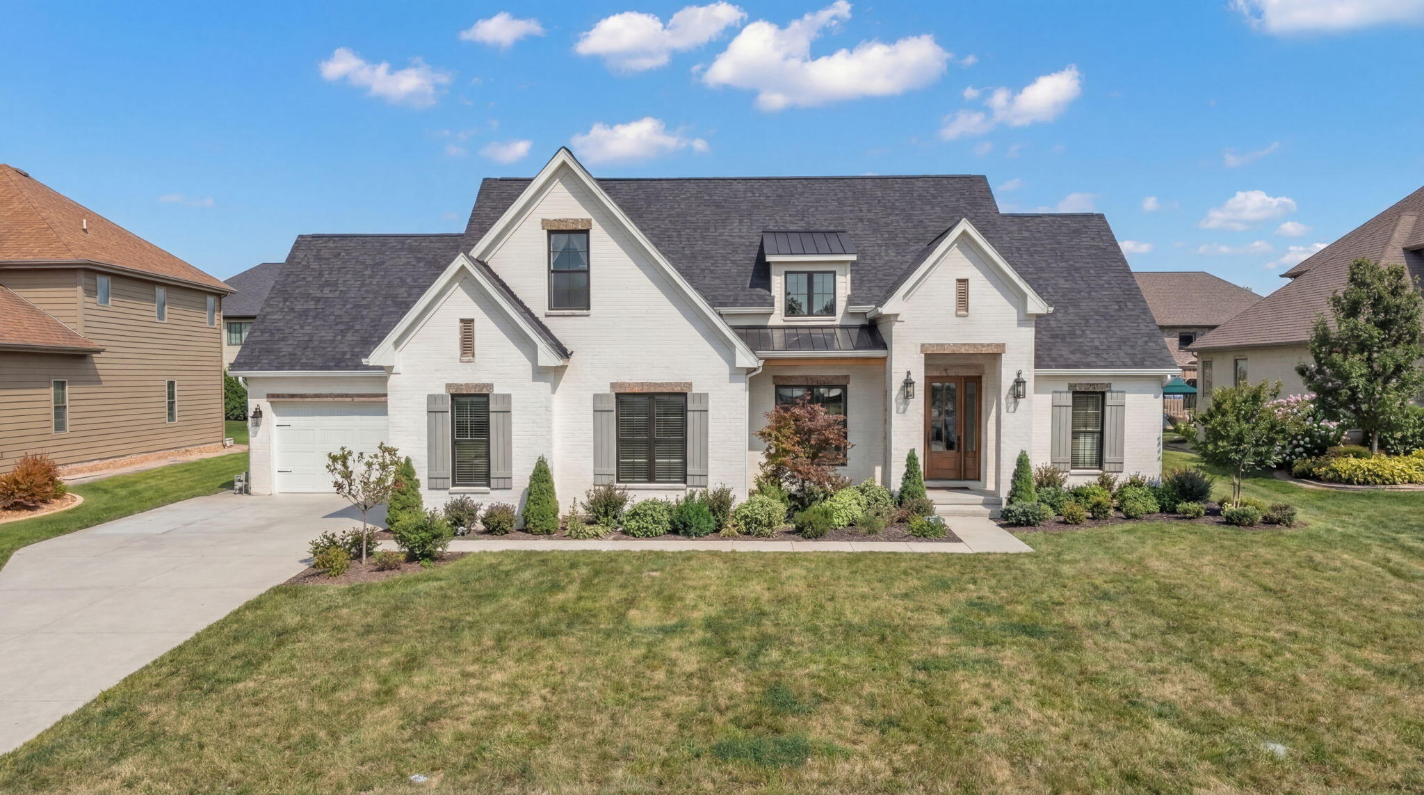 10317 Margo Lane Munster, IN 46321 - Photo 15 of 16 a front view of a house with a yard