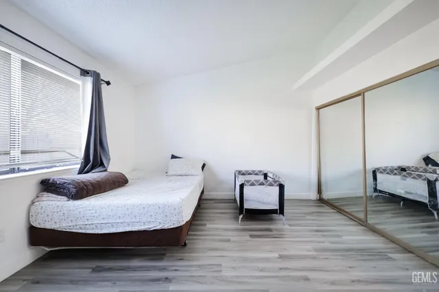 a room with furniture and a wooden floor