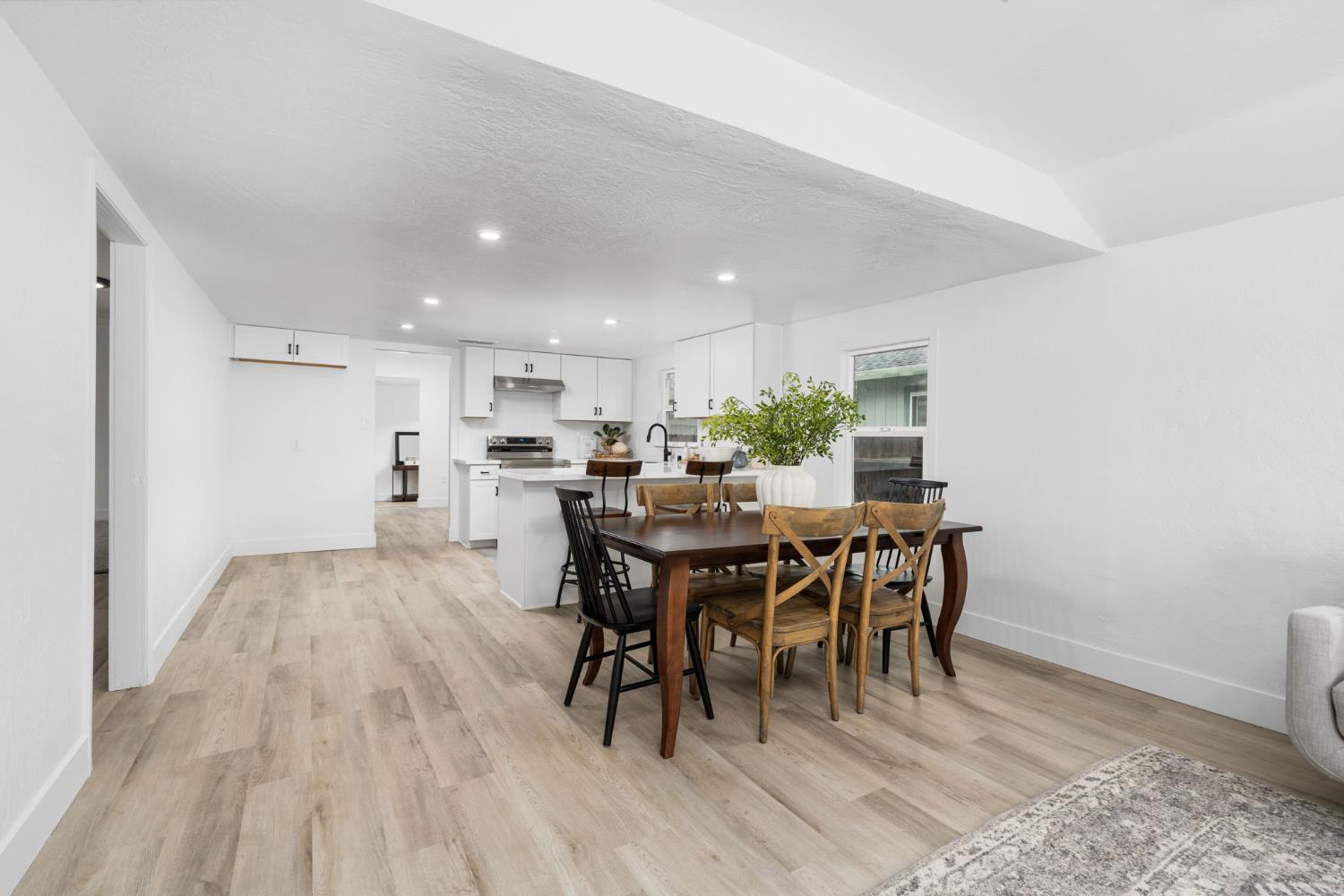 1366 East Alexander Avenue Merced, CA 95340 - Photo 11 of 30 a view of a dining room with furniture and wooden floor