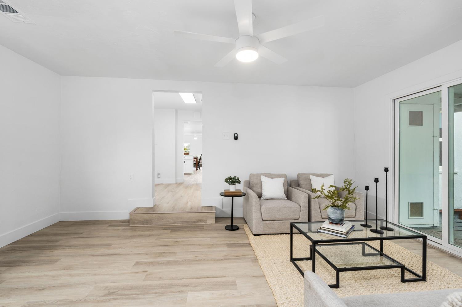 1366 East Alexander Avenue Merced, CA 95340 - Photo 19 of 30 a living room with furniture and white walls