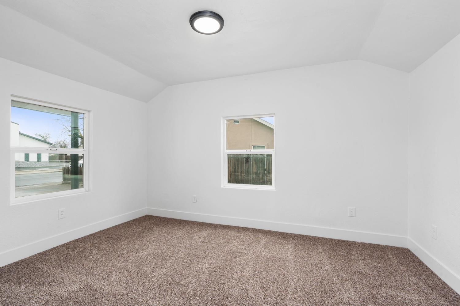 1366 East Alexander Avenue Merced, CA 95340 - Photo 20 of 30 an empty room with a window