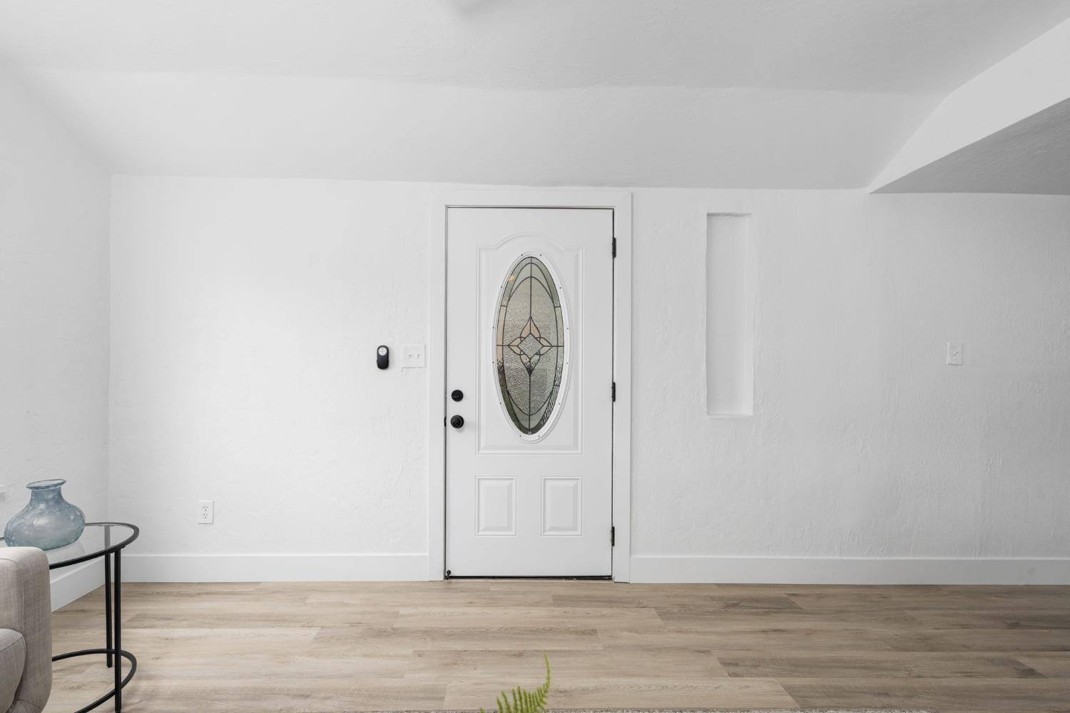 1366 East Alexander Avenue Merced, CA 95340 - Photo 5 of 30 a view of a livingroom with wooden floor and a window