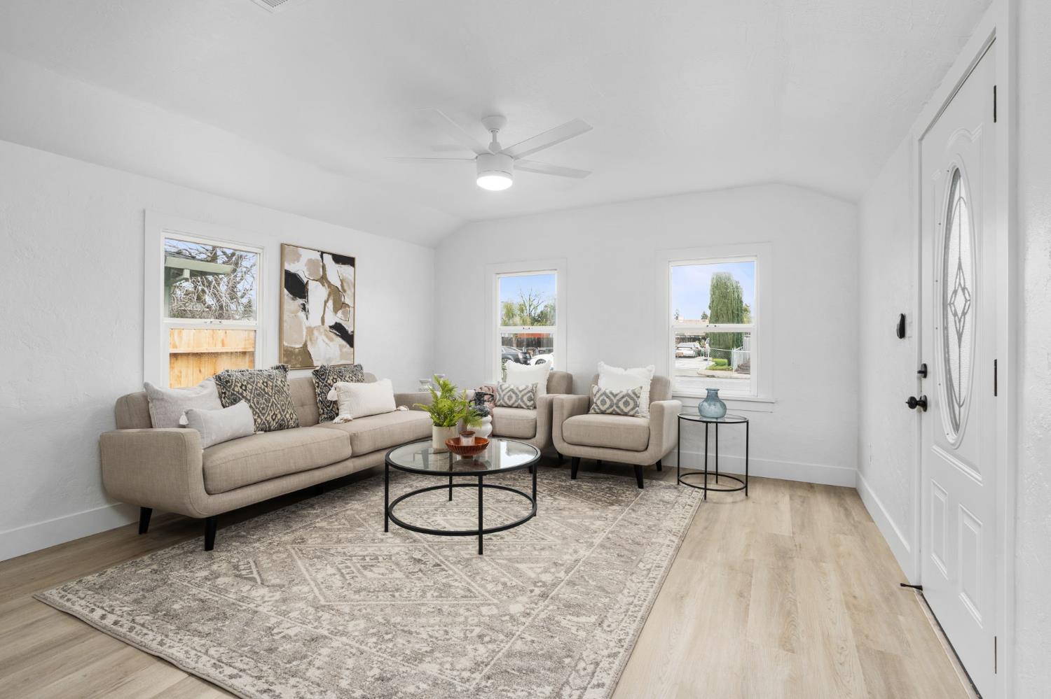 1366 East Alexander Avenue Merced, CA 95340 - Photo 6 of 30 a living room with furniture and a rug