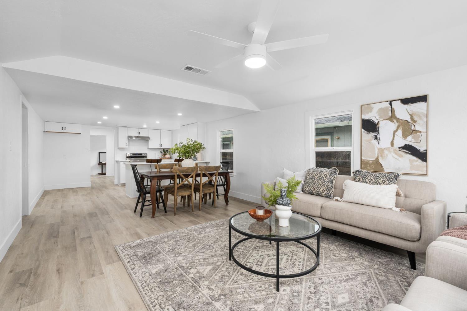 1366 East Alexander Avenue Merced, CA 95340 - Photo 8 of 30 a living room with furniture a rug and a table
