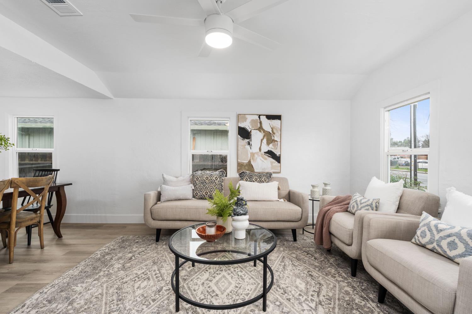1366 East Alexander Avenue Merced, CA 95340 - Photo 9 of 30 a living room with furniture and a large window