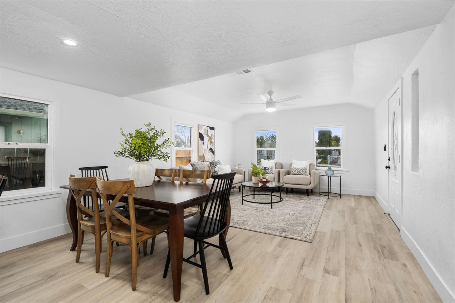 1366 East Alexander Avenue Merced, CA 95340 - Photo 10 of 30 a view of a dining room with furniture and wooden floor