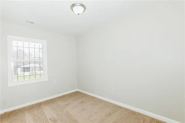 an empty room with a window