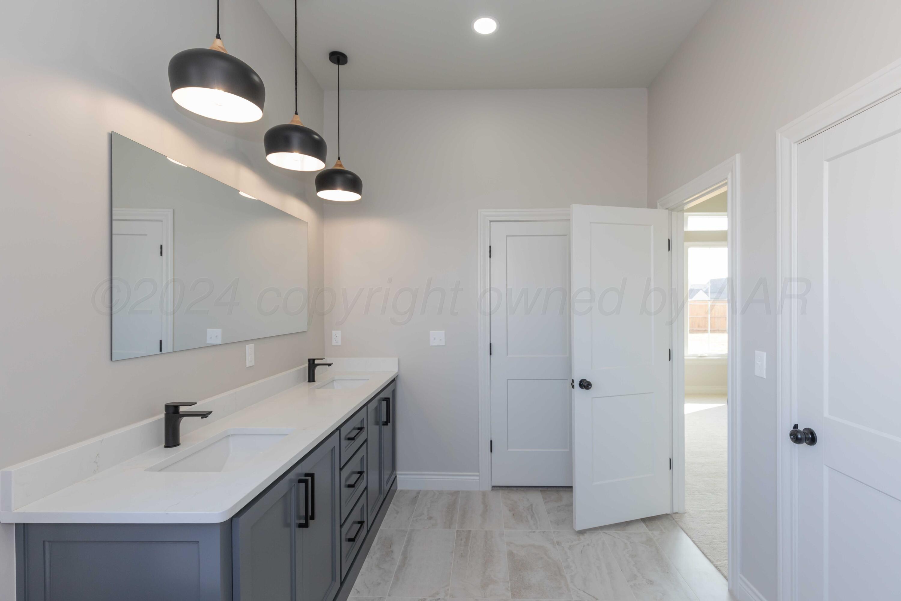 9671 Garrison Creek Drive Amarillo, TX 79119 - Photo 52 of 68 PRIMARY BATH VIEW 1