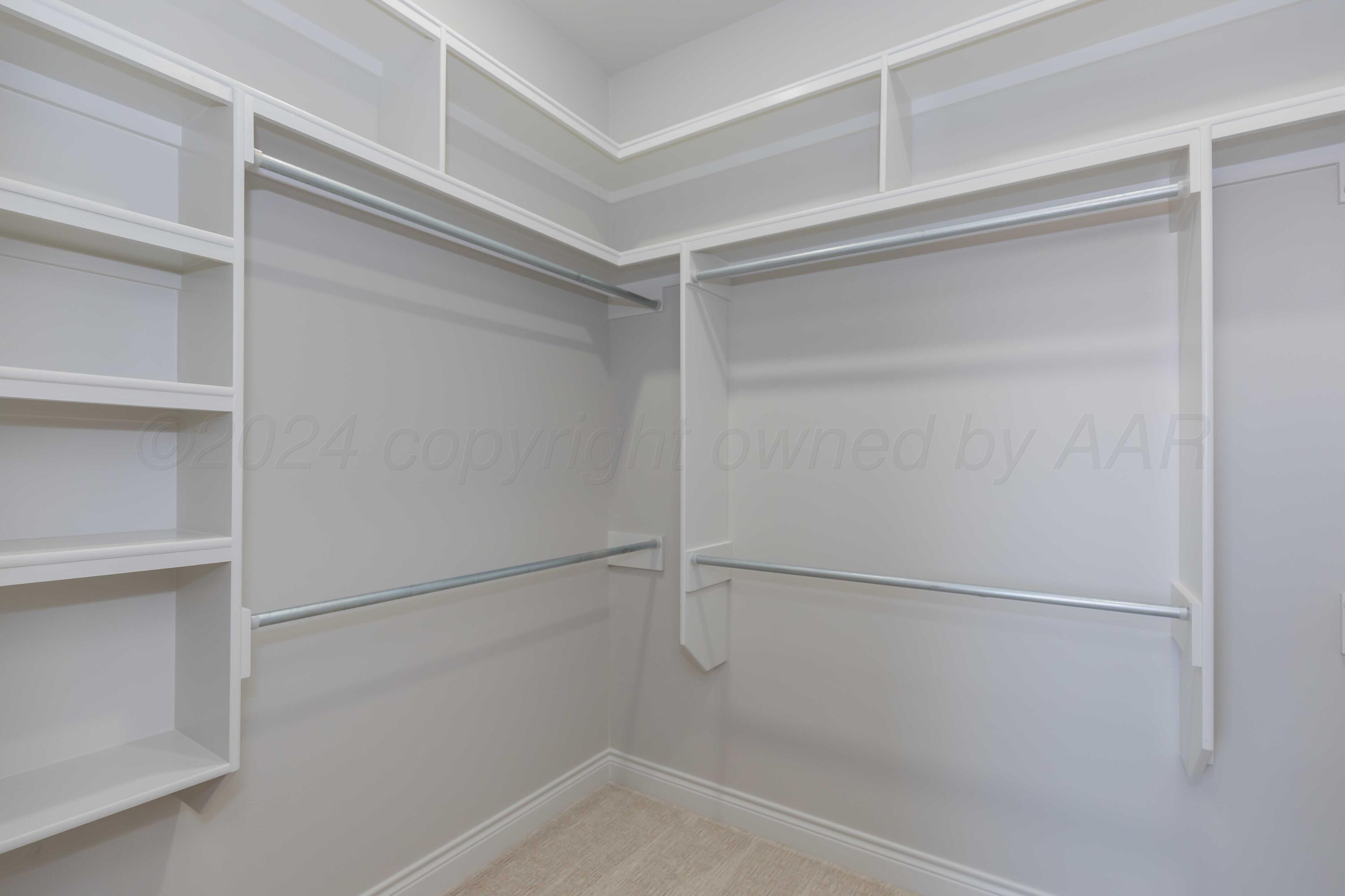 9671 Garrison Creek Drive Amarillo, TX 79119 - Photo 61 of 68 PRIMARY CLOSET VIEW 1