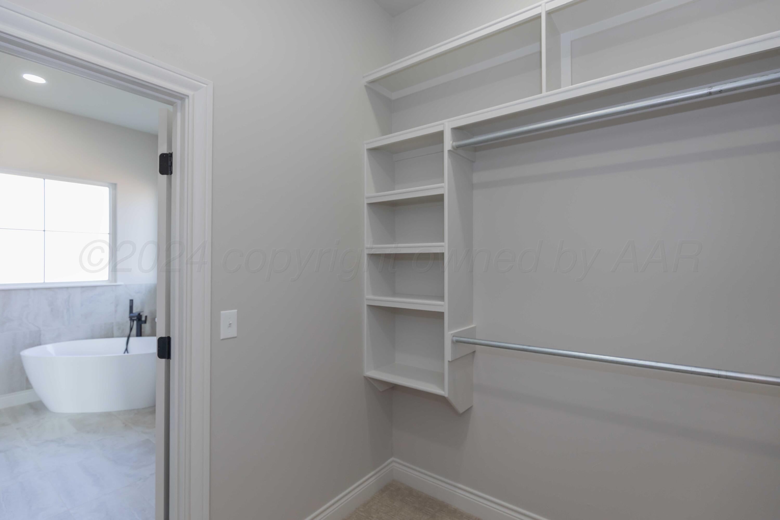 9671 Garrison Creek Drive Amarillo, TX 79119 - Photo 63 of 68 PRIMARY CLOSET VIEW 3