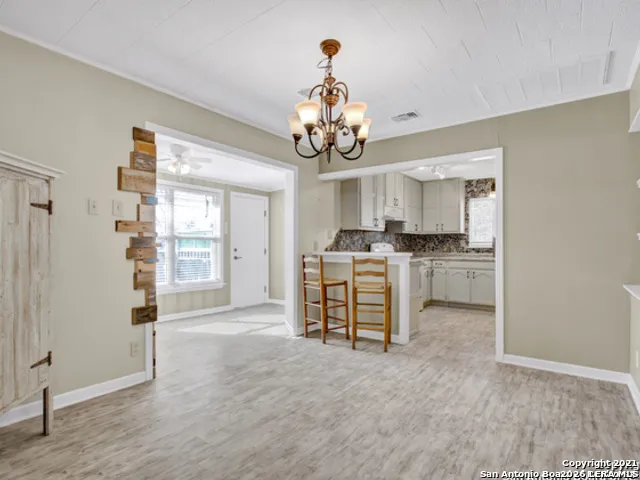 a view of a kitchen with a sink