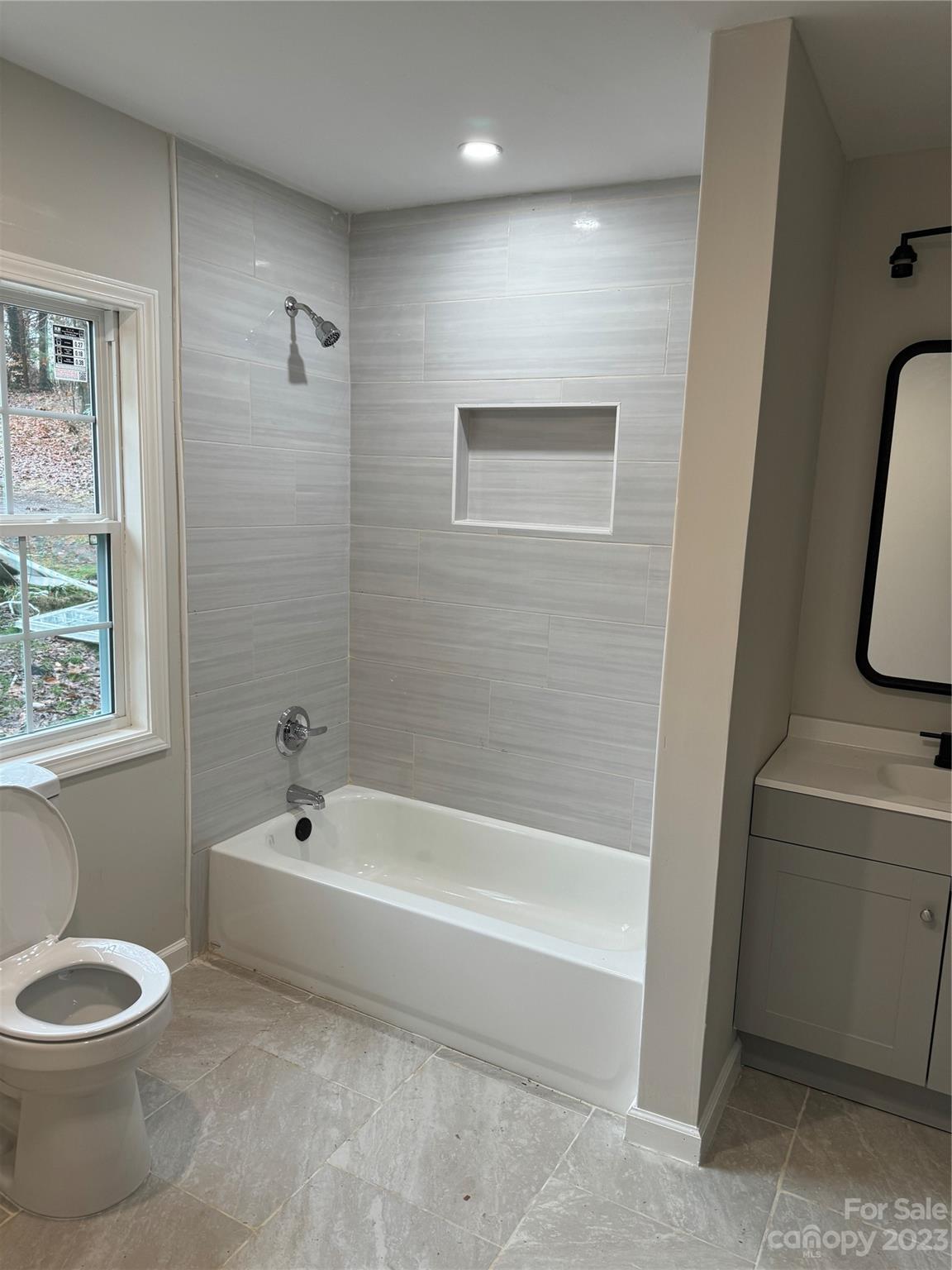285 Arrowood Road Salisbury, NC 28144 - Photo 9 of 15 a bathroom with a toilet and a bathtub