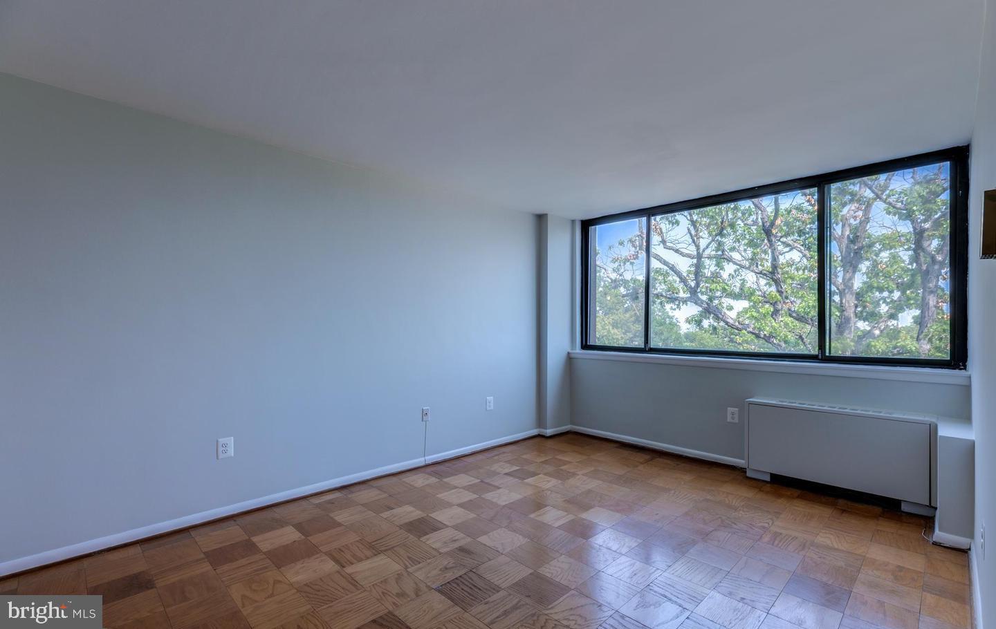 4401 Cherry Hill Road, Unit 66 Arlington, VA 22207 - Photo 15 of 29 an empty room with large windows