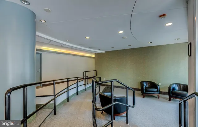 a view of a hallway with workspace