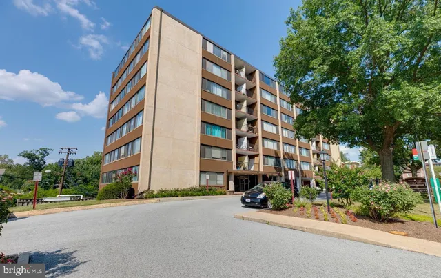 front view of a building and a street view