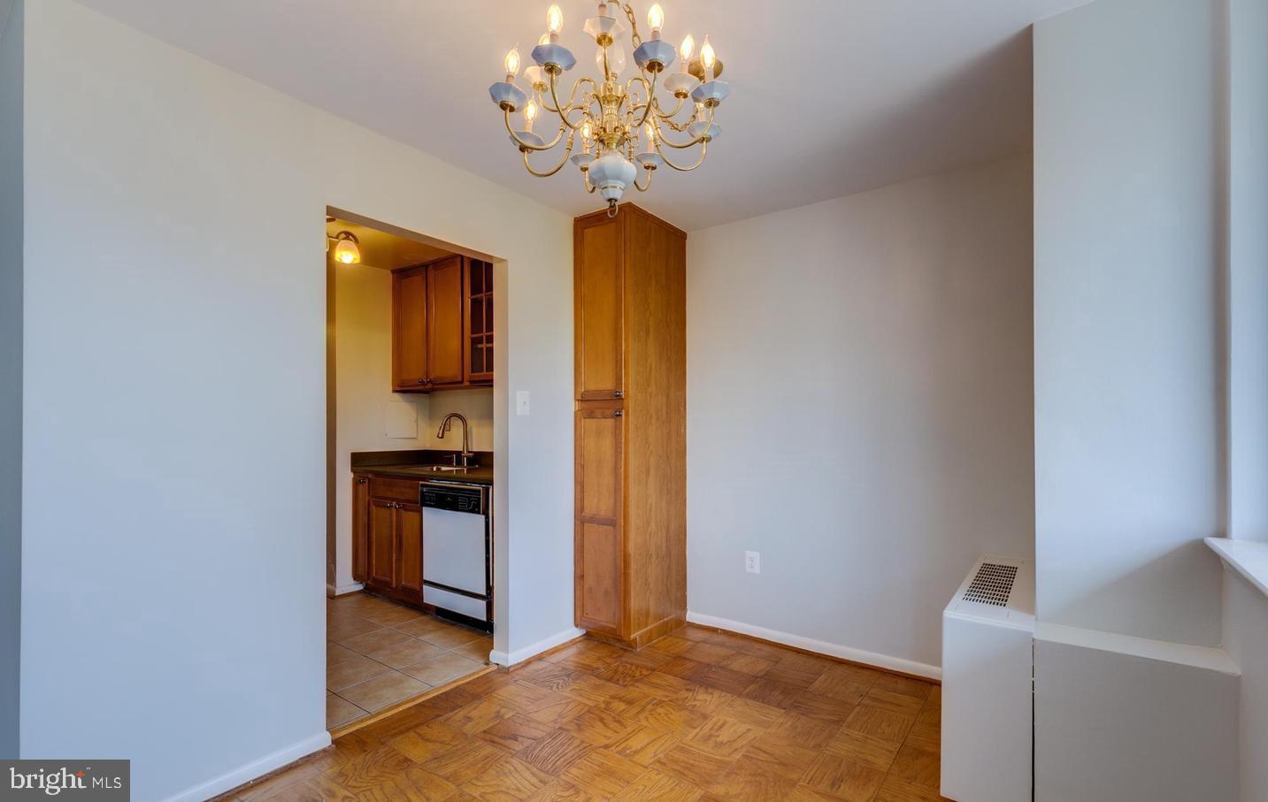 4401 Cherry Hill Road, Unit 66 Arlington, VA 22207 - Photo 8 of 29 a very nice looking room with a chandelier