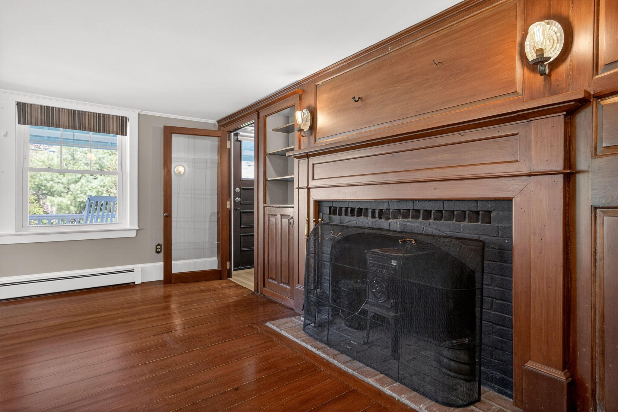 69 County Road Bourne, MA 02532 - Photo 21 of 54 a view of livingroom with furniture wooden floor fireplace and window