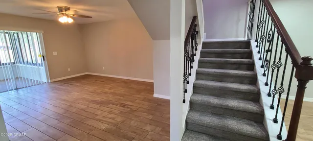 a view of a small space with wooden floor and a window