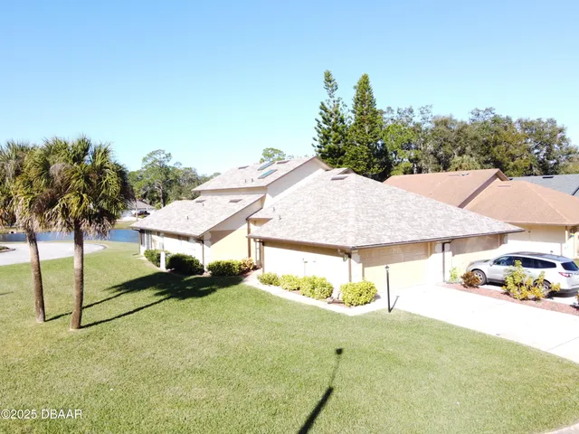 a house view with a garden space