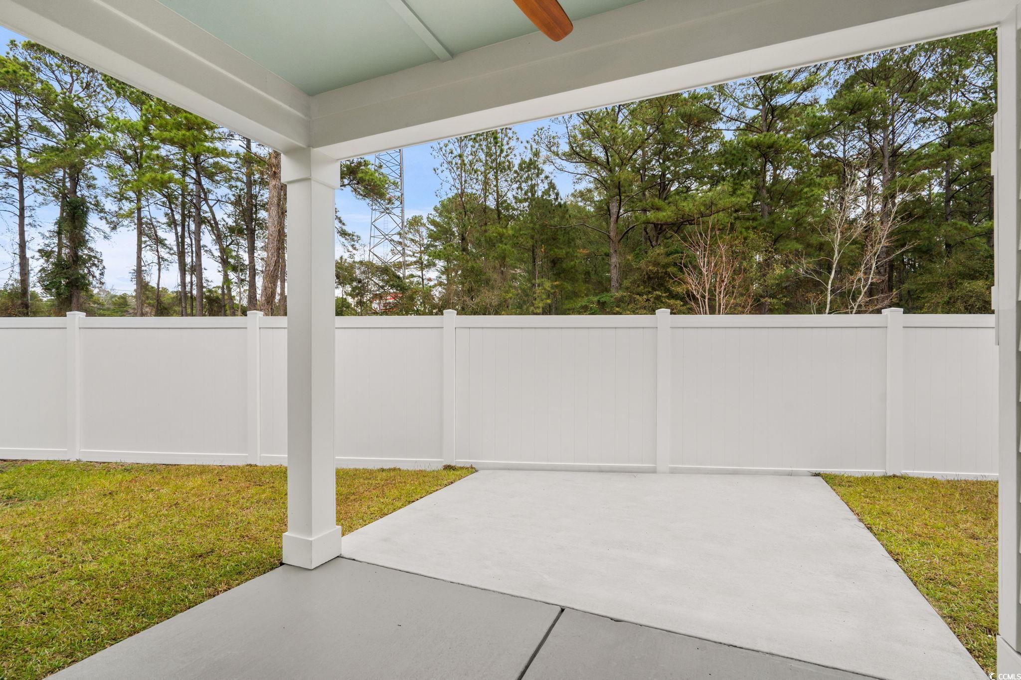 148 Arbor Ridge Circle Conway, SC 29526 - Photo 20 of 37 Fenced backyard with a patio area