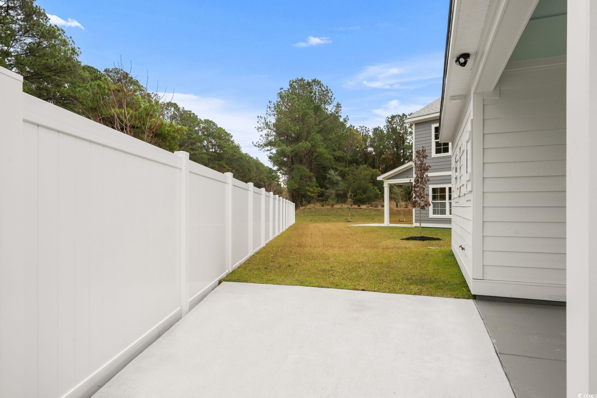 148 Arbor Ridge Circle Conway, SC 29526 - Photo 22 of 37 View of yard featuring a patio area
