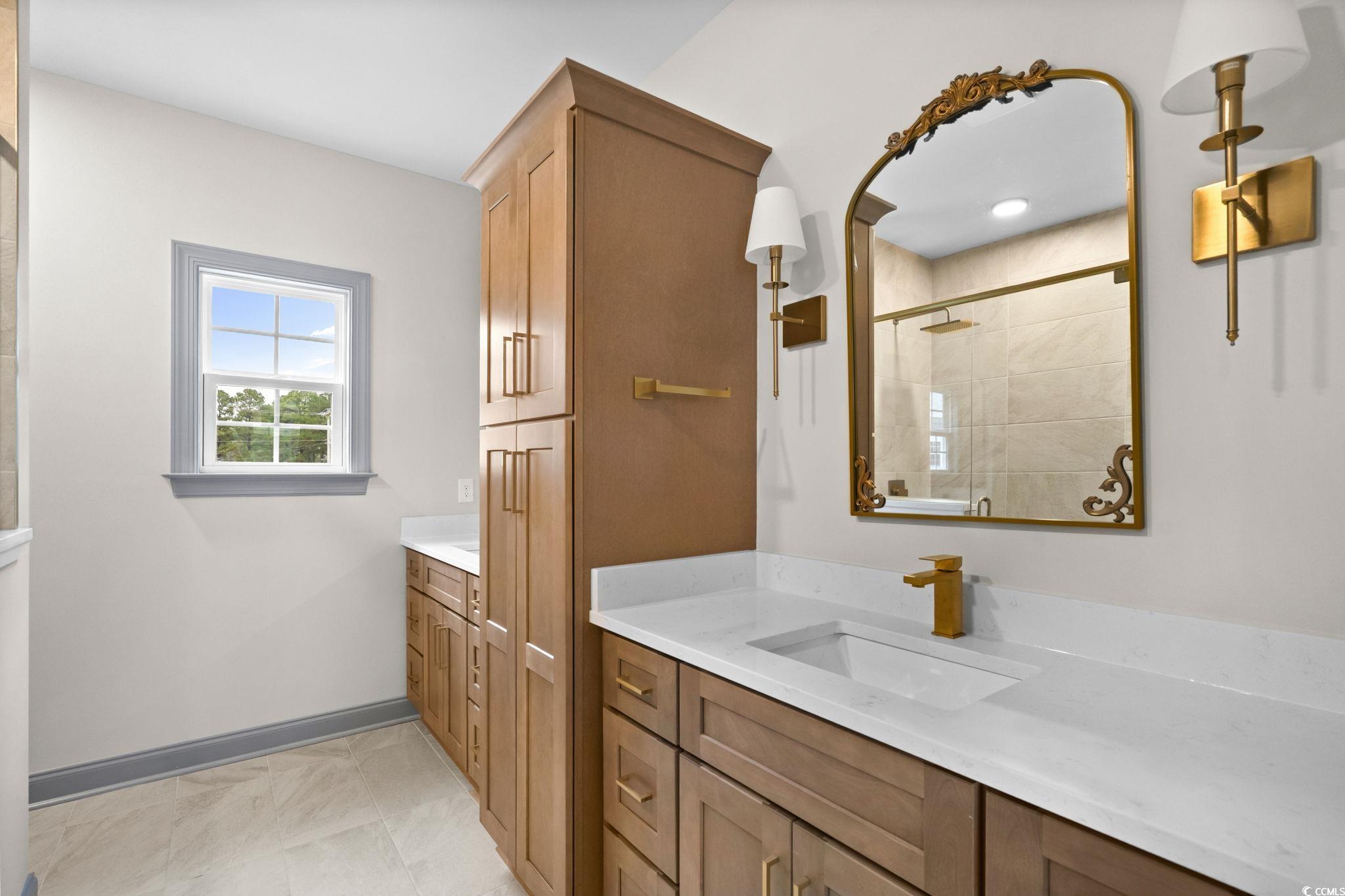148 Arbor Ridge Circle Conway, SC 29526 - Photo 28 of 37 Full bathroom with vanity and a stall shower