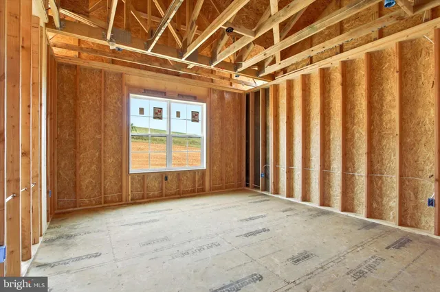 a view of a room with windows