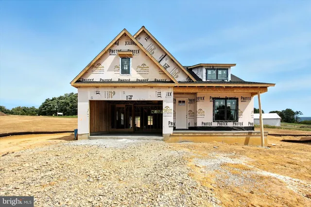 a view of a house with large outdoor space