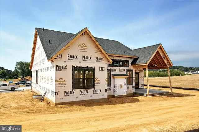 a view of a house with a swimming pool