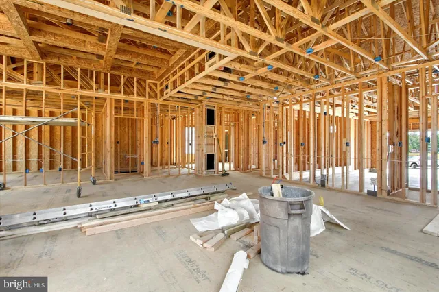 a view of a patio with a table and chairs