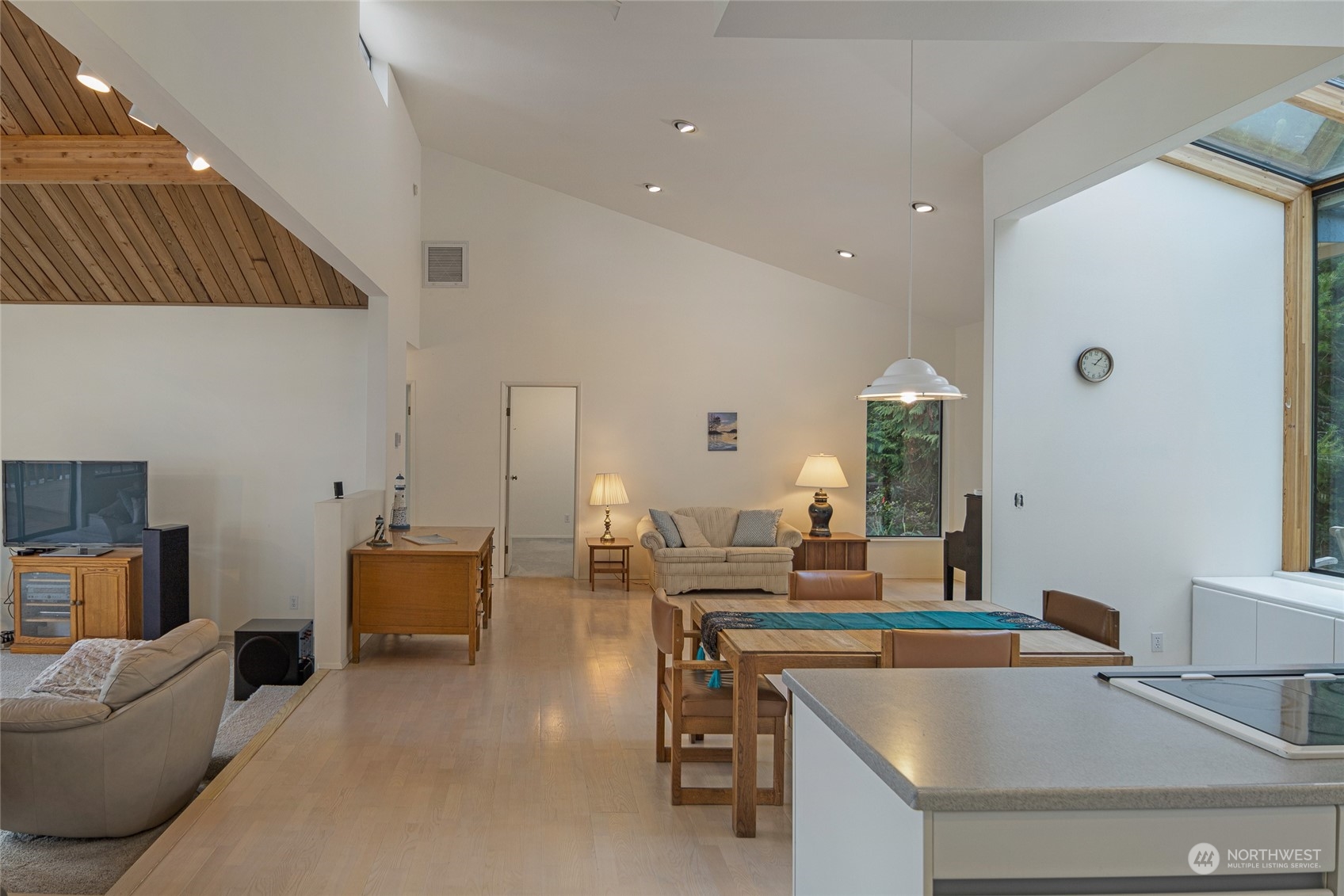 1045 Port Stanley Road Lopez Island, WA 98261 - Photo 12 of 40 a living room with furniture and a window