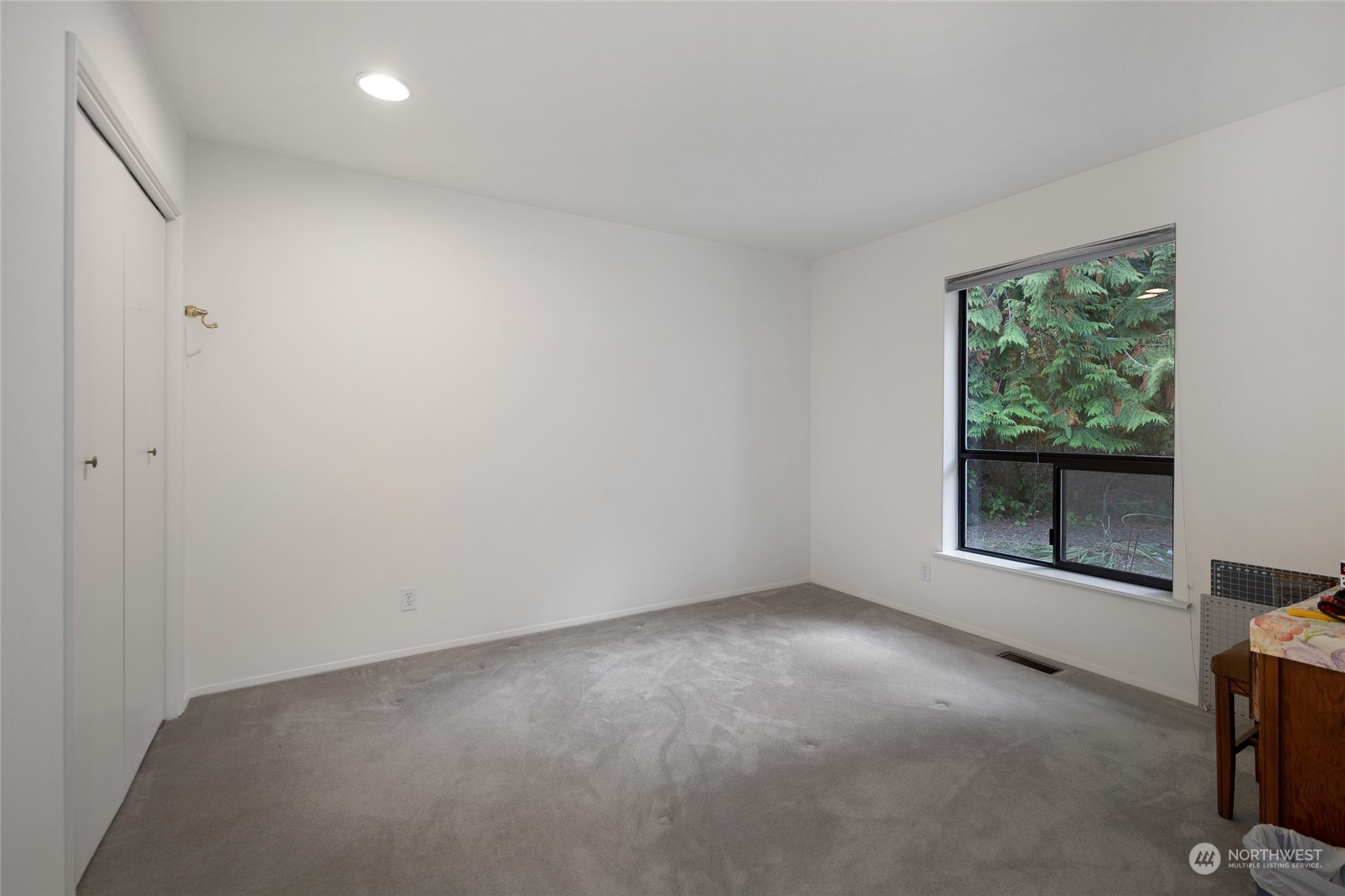 1045 Port Stanley Road Lopez Island, WA 98261 - Photo 24 of 40 wooden floor and window in an empty room