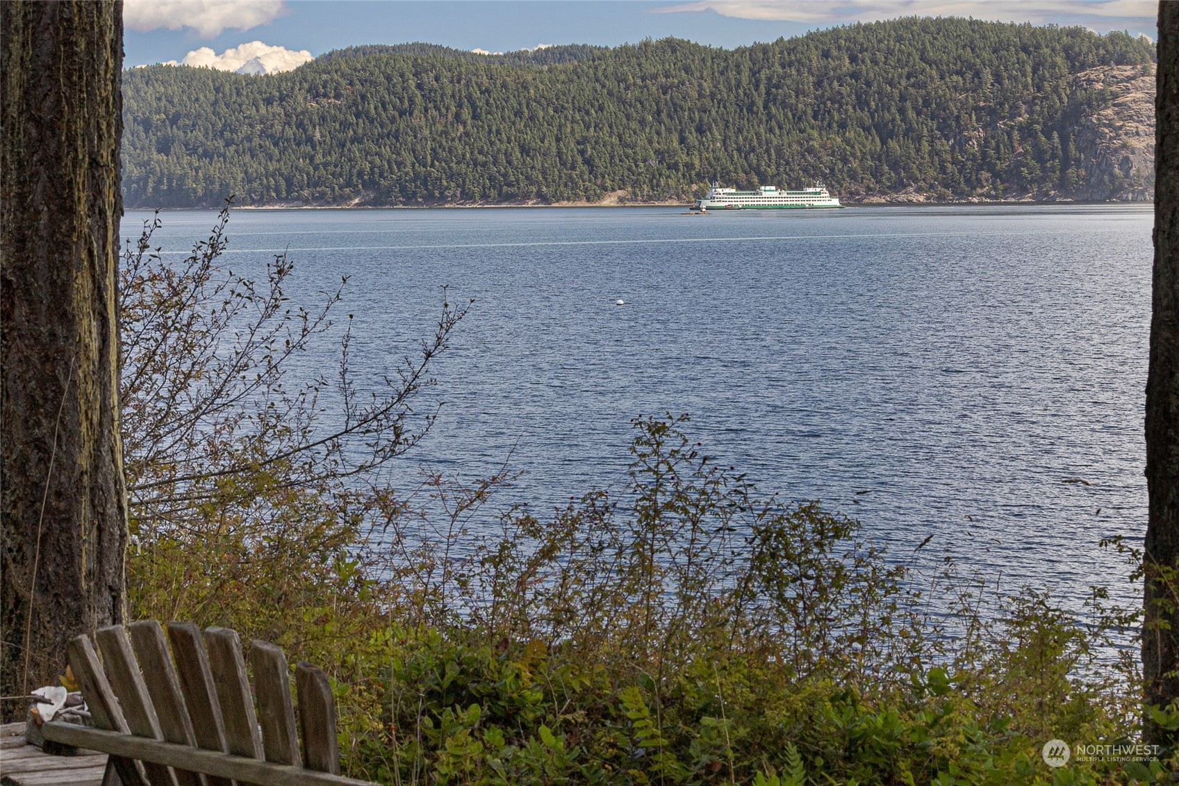 1045 Port Stanley Road Lopez Island, WA 98261 - Photo 28 of 40 a view of a yard next to a building