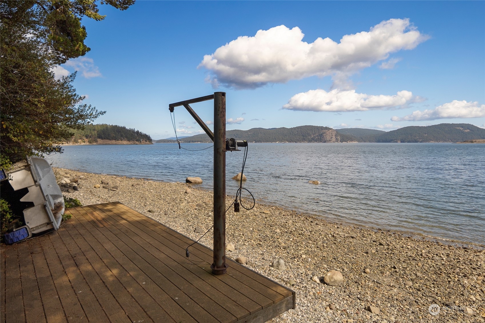 1045 Port Stanley Road Lopez Island, WA 98261 - Photo 32 of 40 a view of a terrace with a bench