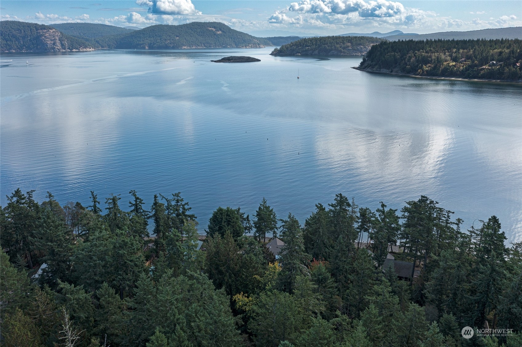 1045 Port Stanley Road Lopez Island, WA 98261 - Photo 39 of 40 a view of a lake from a yard