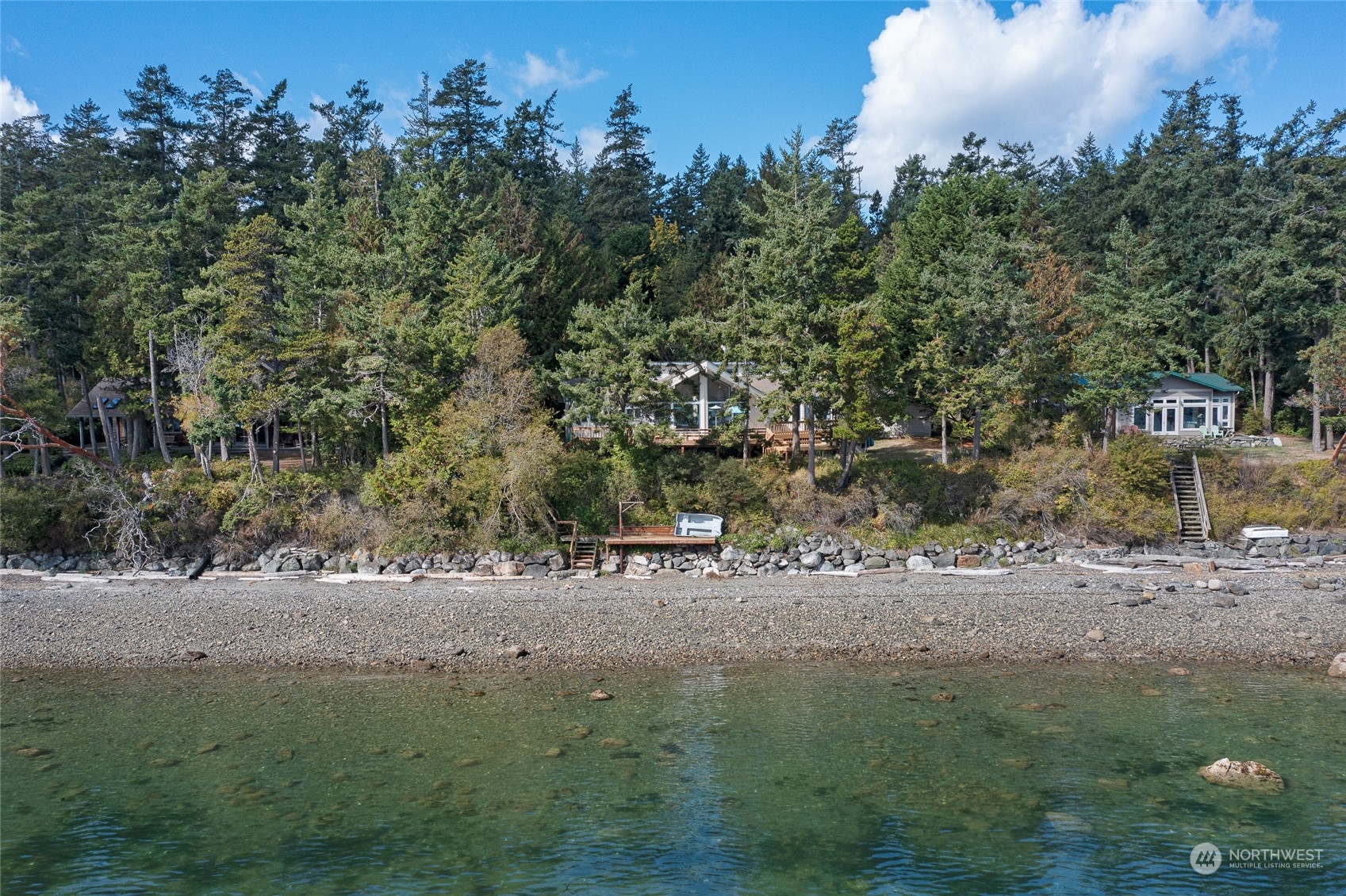1045 Port Stanley Road Lopez Island, WA 98261 - Photo 4 of 40 a view of a dirt road and trees