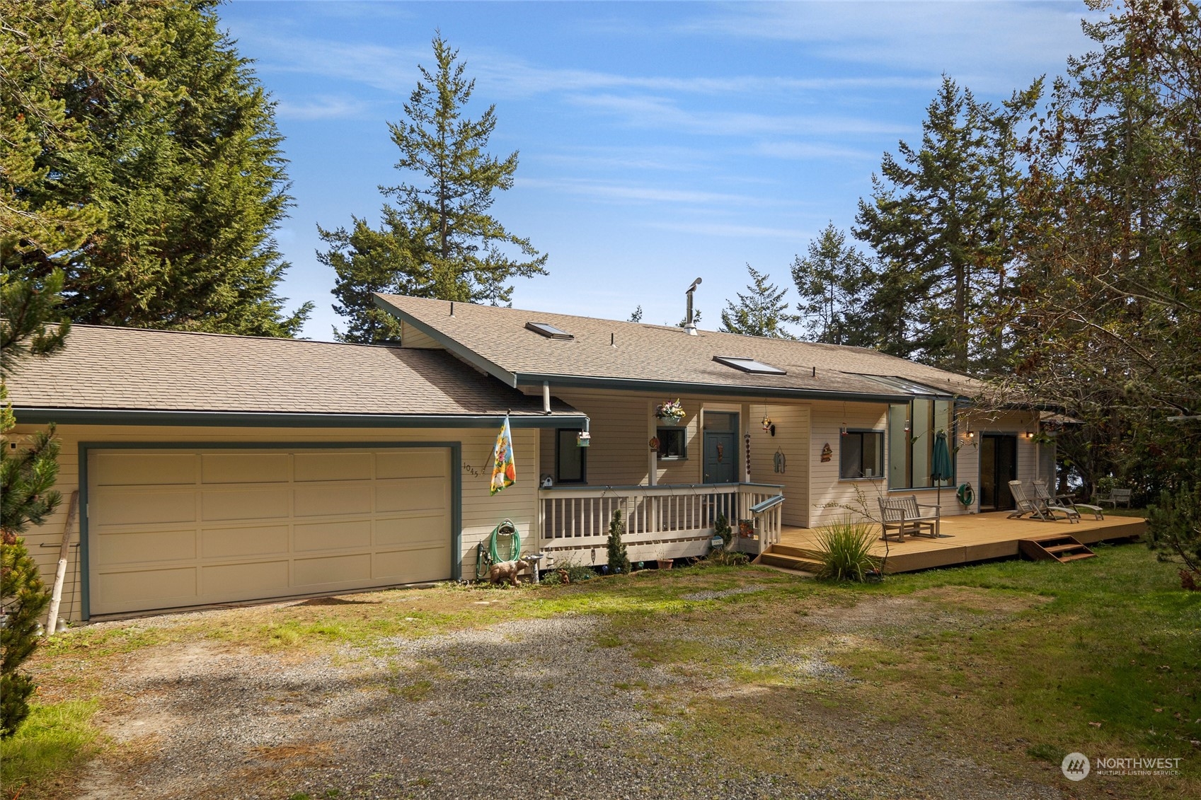 1045 Port Stanley Road Lopez Island, WA 98261 - Photo 6 of 40 a front view of a house with garden