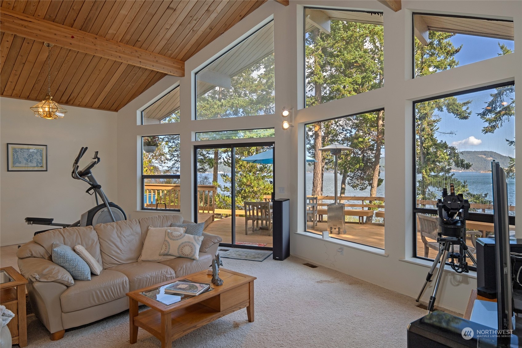 1045 Port Stanley Road Lopez Island, WA 98261 - Photo 8 of 40 a living room with furniture and a large window