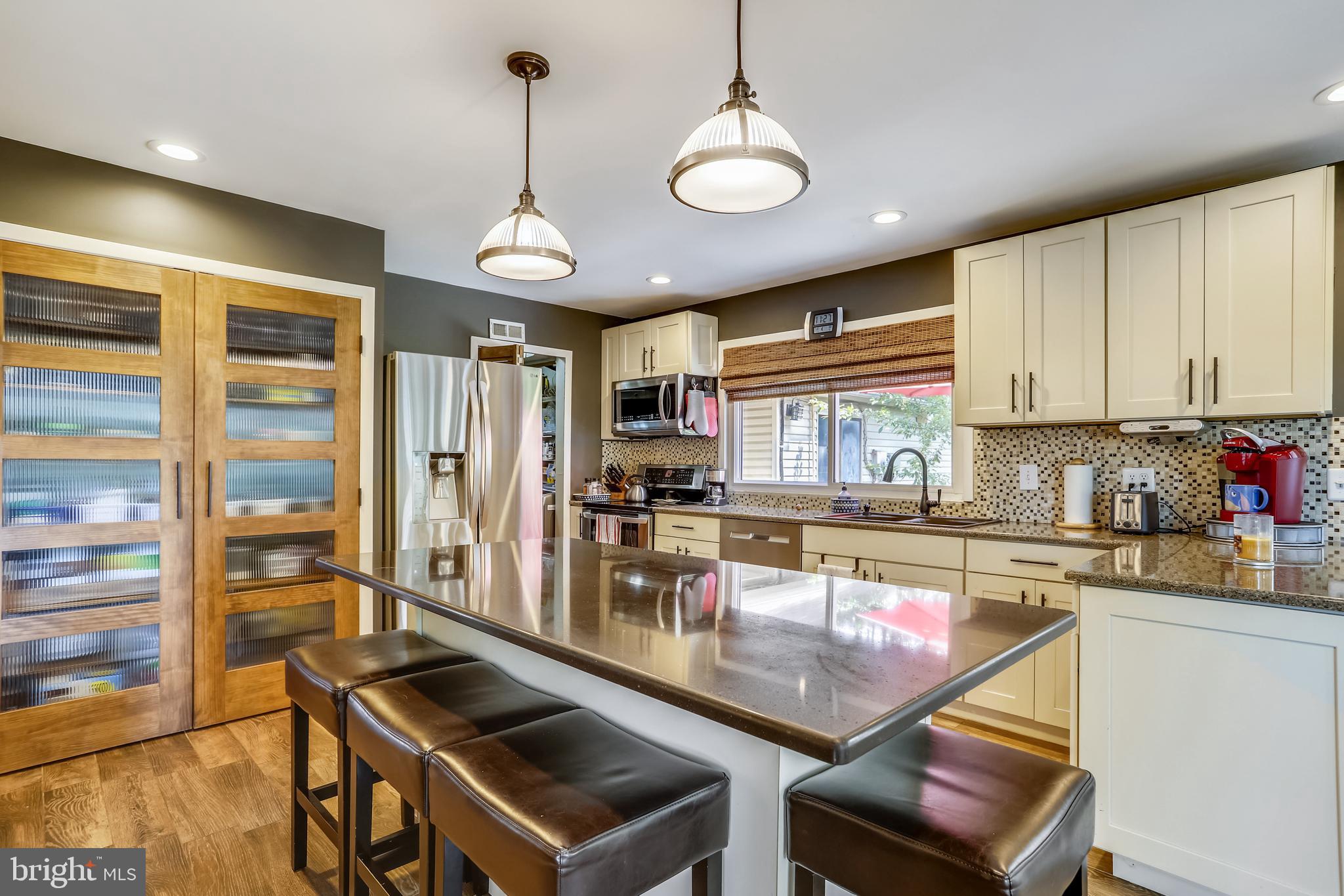 49 Thrush Road Sterling, VA 20164 - Photo 16 of 62 Large kitchen island with cabinet space