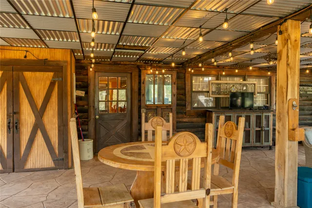 a view of a forest with a yard