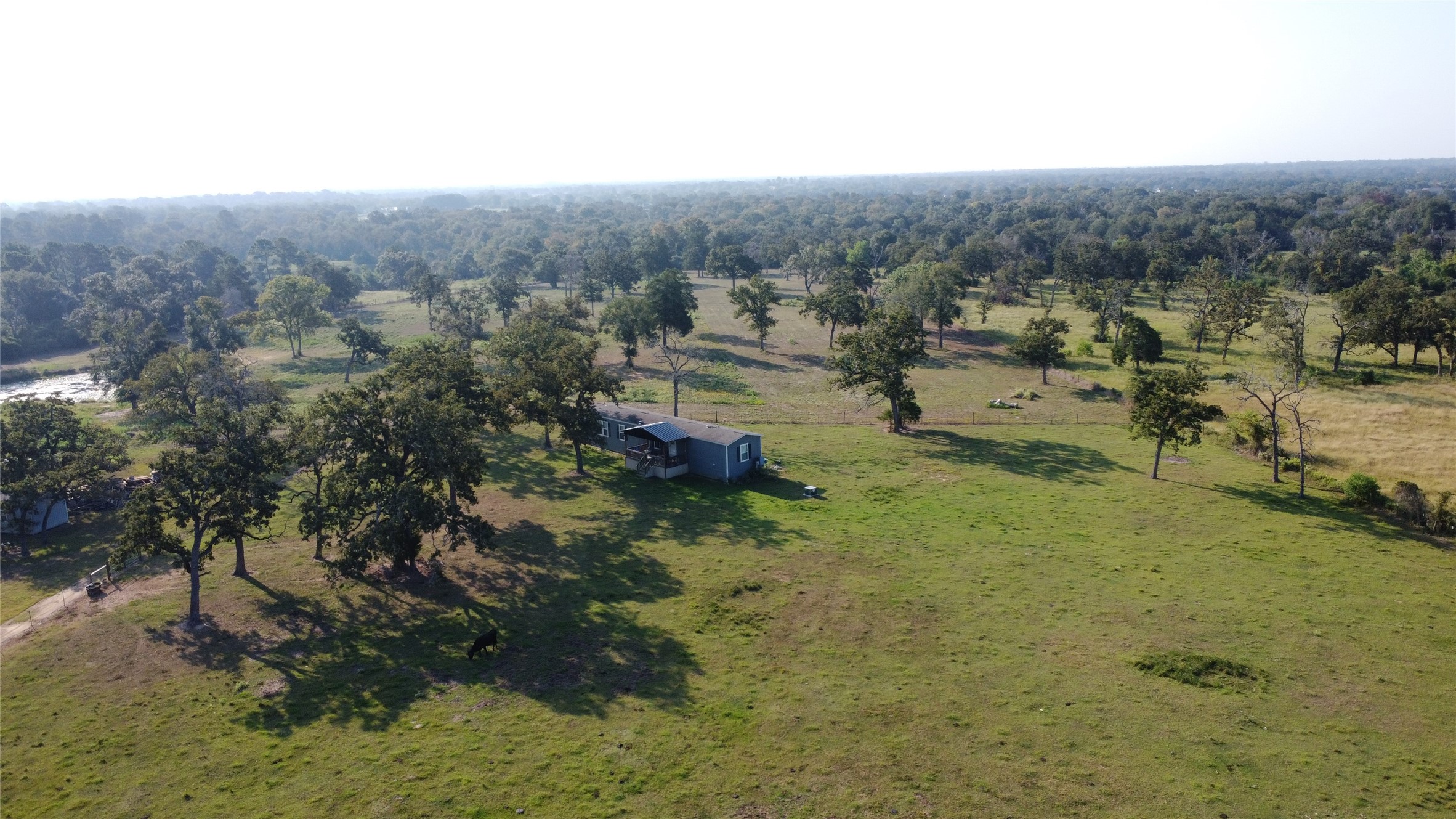23888 Laneview Road Hempstead, TX 77445 - Photo 17 of 39 a view of a town with mountains in the background