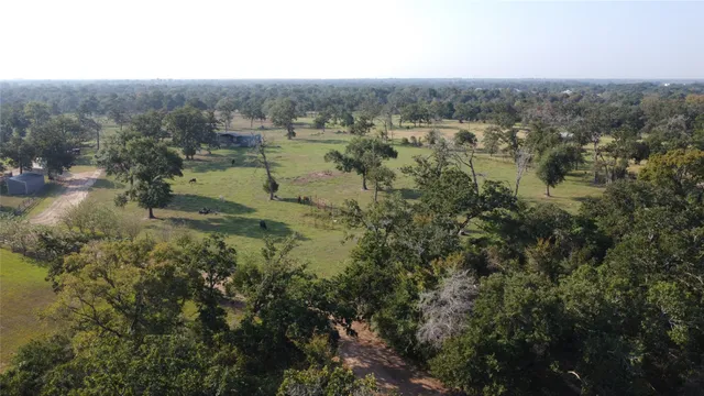 a view of a chairs and tables in patio