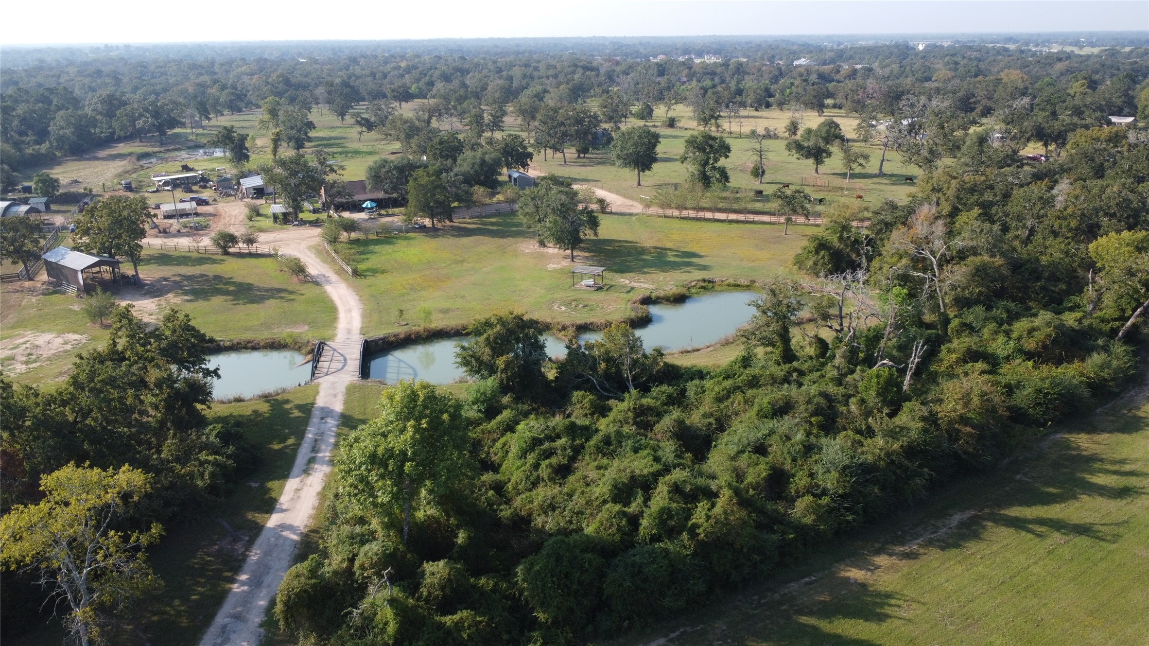 23888 Laneview Road Hempstead, TX 77445 - Photo 20 of 39 a view of a lake with mountains in the background
