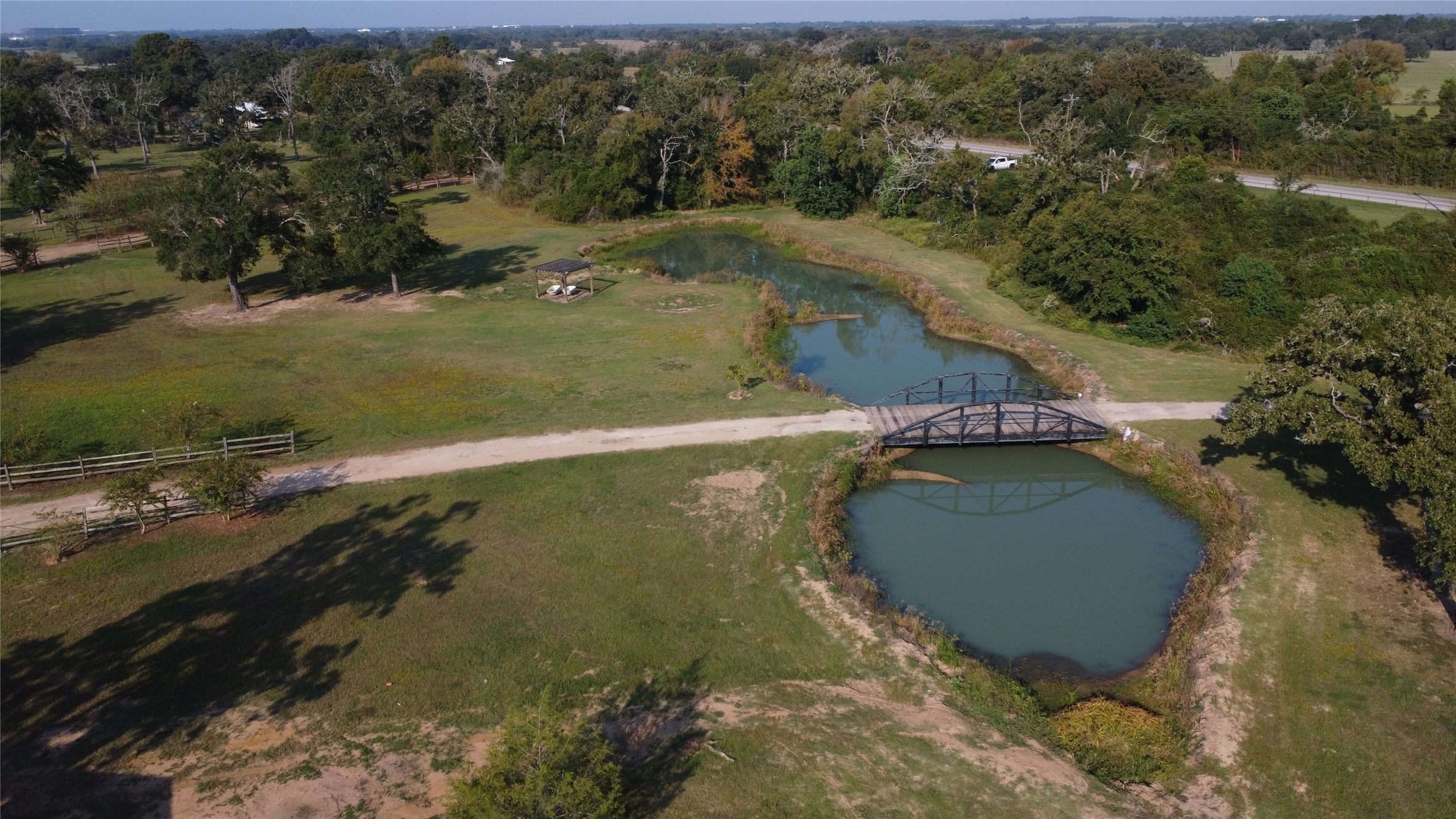23888 Laneview Road Hempstead, TX 77445 - Photo 2 of 39 an aerial view of a house with a yard