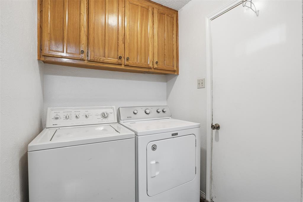 6437 High Lawn Terrace Watauga, TX 76148 - Photo 12 of 21 a utility room with dryer and washer