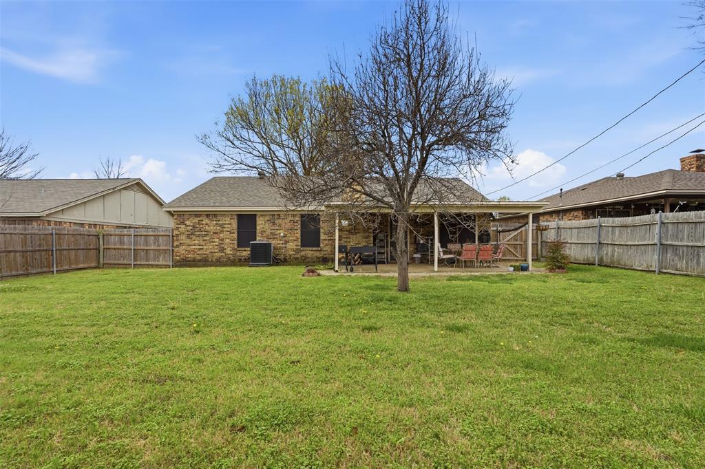 6437 High Lawn Terrace Watauga, TX 76148 - Photo 19 of 21 a view of a house with a backyard