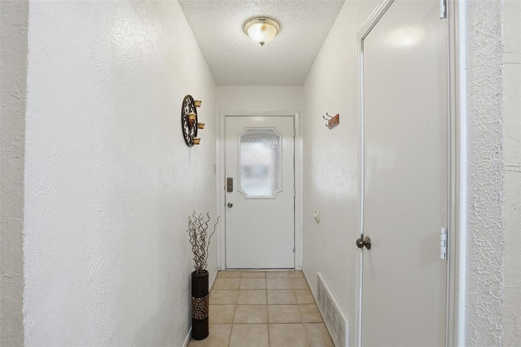 6437 High Lawn Terrace Watauga, TX 76148 - Photo 5 of 21 a bathroom with a shower and a sink