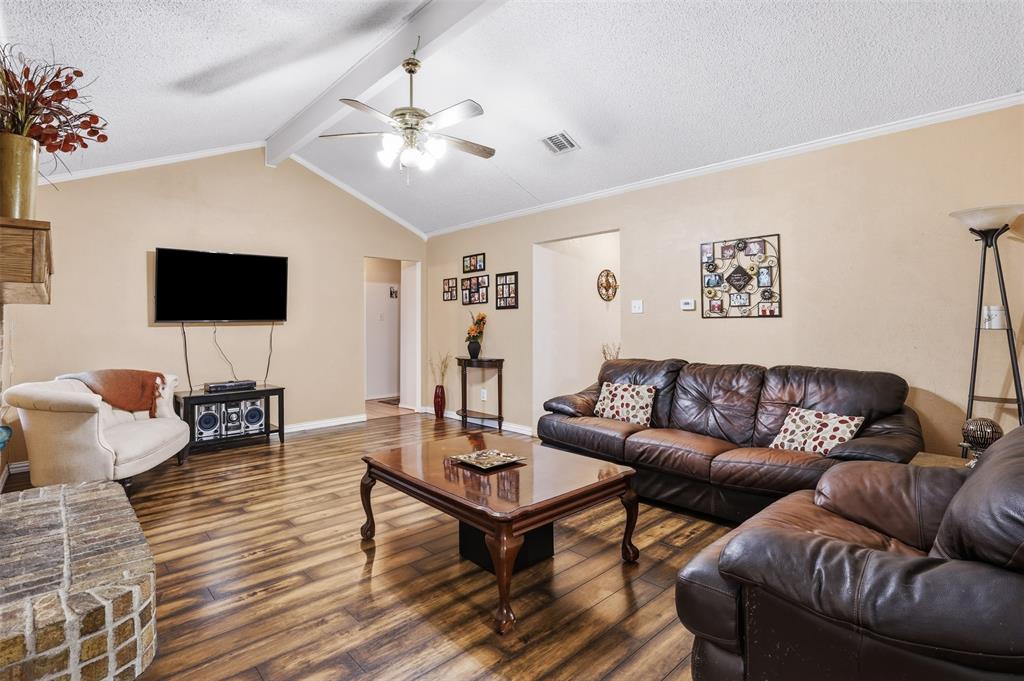 6437 High Lawn Terrace Watauga, TX 76148 - Photo 7 of 21 a living room with furniture and a flat screen tv