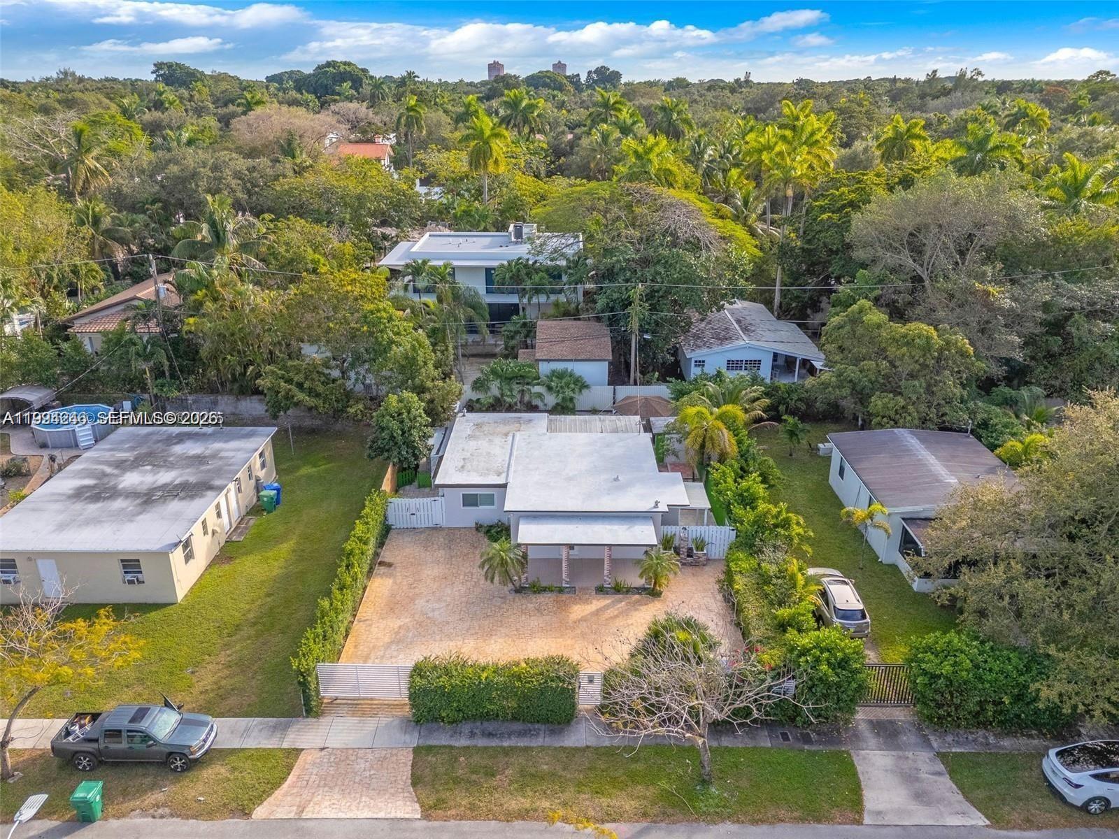 3800 Charles Terrace Miami, FL 33133 - Photo 15 of 16 an aerial view of a house with a garden
